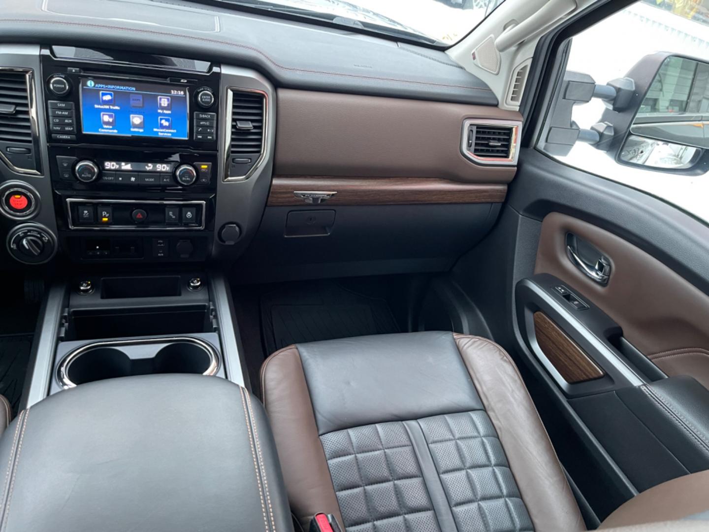 2016 Black /black leather Nissan Titan XD PLATINUM RESERVE 4WD (1N6BA1F46GN) with an 5.0L V8 DOHC 32V DIESEL engine, 6A transmission, located at 1960 Industrial Drive, Wasilla, 99654, (907) 274-2277, 61.573475, -149.400146 - Photo#13